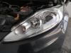 Ford Fiesta JA8 original Scheinwerfer links Hella Halogen mit LWR BJ2009