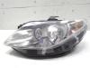 Seat Ibiza ST Kombi 6J original Scheinwerfer links Halogen mit LWR BJ2010